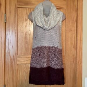 Women’s long cable knit sleeveless sweater. Multiple colors and nice condition.